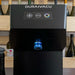 The Duravacu from the Duravin+ range by Winefit front image - close up view of the front of the unit with the nozzle for the wine bottle in blue lighting 